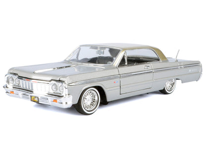 1964 Chevrolet Impala Lowrider Hard Top Silver Metallic with Gold Metallic Top "Get Low" Series 1/24 Diecast Model Car by Motormax-1
